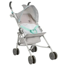 Light gray shark-themed stroller with a smiling face, adjustable canopy, and teal safety harness.