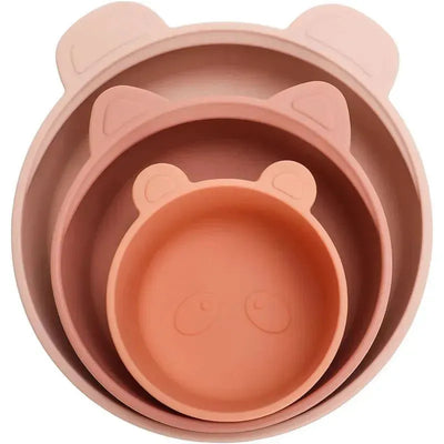 Stackable snack bowl set in terracotta blush, featuring three bowls with bear ear designs on the rim.