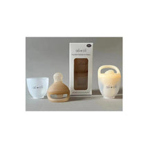 Ali + Oli Food & Fruit Feeder Pacifier set, featuring two silicone feeders and a white packaging box labeled for babies.