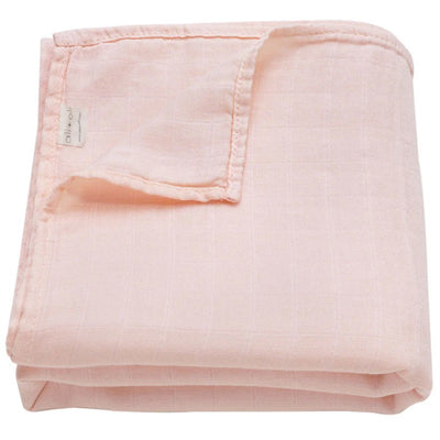 Soft pink Ali+Oli muslin swaddle blanket, neatly folded, showcasing its lightweight, breathable fabric.
