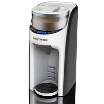 Baby Brezza Baby Formula Pro Advance machine for automated formula preparation, featuring a digital display and dispensing spout.