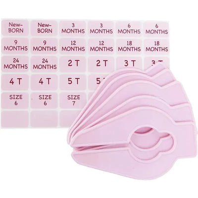 Five pink closet organizers labeled with baby clothing sizes, including months and toddler sizes.
