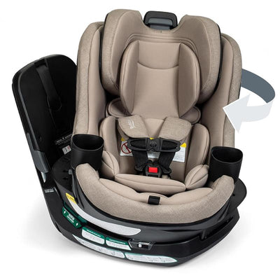 Britax Galaxy360 Slim Rotating Convertible Car Seat in Teak, featuring swivel functionality, safety harness, and cup holders.