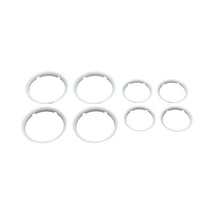 White wheel caps for Bugaboo Fox stroller, featuring eight circular components in varying sizes, designed for customization.