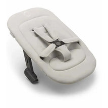 Bugaboo Giraffe Newborn Set in Polar White, featuring a soft fabric seat with adjustable harness and sturdy base.
