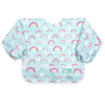Sleeved bib by Bumkins featuring a pastel blue background with colorful rainbows and clouds.