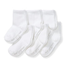 Solid organic cotton baby crew socks in a pack of six, featuring a white design and printed branding.