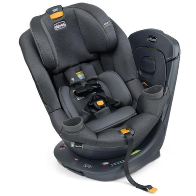 Chicco Fit360 ClearTex Rotating Convertible Car Seat in carbon/grey, featuring adjustable harness system and cup holders.