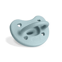 Chicco Physioforma Luxe pacifier in coastal blue, designed for infants aged 6-16 months, featuring a textured surface.