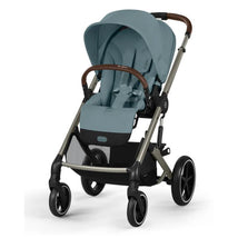 Cybex Balios S Lux Stroller in Stormy Blue, featuring a padded seat, canopy, and brown handle, designed for comfort and safety.