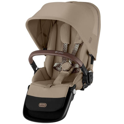 Cybex Egazelle S second seat in almond beige with taupe frame, featuring a padded seat, adjustable canopy, and safety harness.