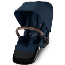 Cybex Gazelle S Second Seat in Ocean Blue with Silver Frame, featuring a padded seat and a brown handlebar.