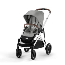 Cybex Gazelle S Single-to-Double Stroller in silver with stone grey seat, featuring a brown handle and adjustable canopy.