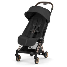 Cybex Platinum Coya stroller in sepia black with a rose gold frame, featuring a modern, compact design and a padded seat.