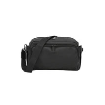 Black DFY - R1 Diaper Bag with shoulder strap, featuring multiple compartments and a sleek, modern design.