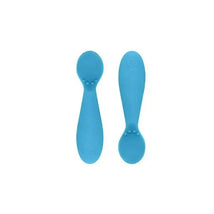 Blue silicone spoons from the Ezpz Happy Mats Tiny Spoon 2-Pack, designed for easy feeding.