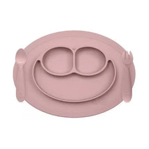 Mini feeding set in blush color featuring a divided plate with a smiley design, spoon, and fork.