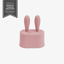Tiny popsicle mold set in pink blush with two removable wands, designed for young children by a pediatric feeding specialist.