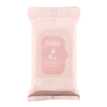 Frida Mom Breast Pump Wipes pack, pink with white text, labeled for cleaning breast pump components.