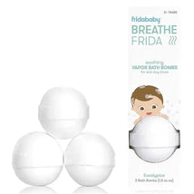 Three white BreatheFrida vapor bath bombs, labeled for soothing bath use, with eucalyptus scent, packaged beside a cartoon child.