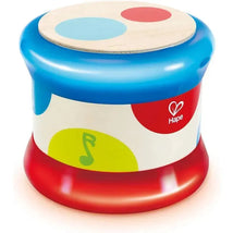 Colorful Hape Baby Drum with a blue top, decorated with red and blue dots, and a music note design on the side.