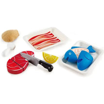 Hape Tasty Proteins Set featuring wooden toy meats, a cutting knife, and a lemon slice on white trays.
