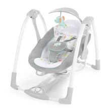 Gray and white baby swing and infant seat with an elephant toy, featuring a soft padded seat and control panel.