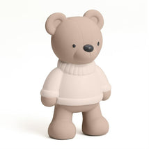 Natural rubber bear teether with a soft brown body and white sweater, designed for infants.