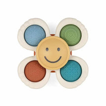 Itzy Ritzy Itzy Pop & Whirl sensory toy featuring a smiling face and textured petals in various colors for tactile play.