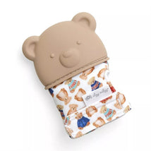 Teething mitt designed for babies, featuring a bear-shaped silicone top and a fabric adorned with classic bear illustrations.