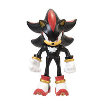 Jakks Sonic 2.5-inch Shadow figure with black and red details, featuring gloves and distinctive red shoes.