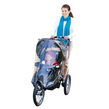 Jogging stroller weather shield protecting a child inside, pushed by a woman in a blue scarf.