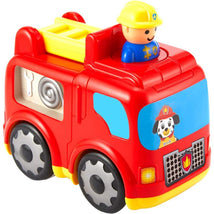 Red toy fire engine with a yellow ladder, featuring a firefighter figure and dog graphic on the front.