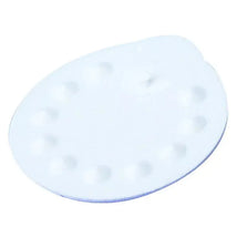 White silicone membrane for Medela breast pumps, featuring a circular design with multiple small openings.