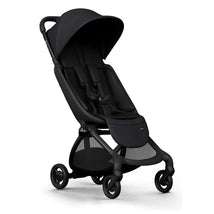 Mima Miro compact stroller featuring a black chassis and seat, designed for easy maneuverability and comfort.
