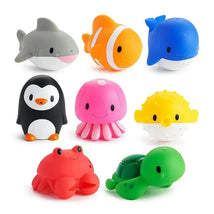 Eight colorful ocean-themed squirters including a shark, clownfish, whale, penguin, jellyfish, pufferfish, crab, and turtle.