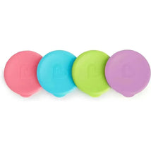 Four colorful silicone lids for the Munchkin Miracle 360 Cup, in pink, blue, green, and purple.