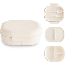 Mushie Bento Lunch Box in ivory, featuring two compartments and a set of mini fork and spoon.