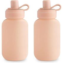 Mushie Puree Pouch in Blush color, featuring a soft silicone design and an easy-to-use screw cap.