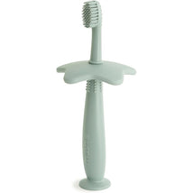 Silicone star-shaped training toothbrush in Cambridge Blue, designed for children with soft bristles and easy grip.