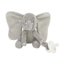 Gray plush Dumbo elephant holding a white pacifier, designed as a comfort buddy for infants.