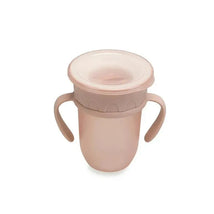 Soft blush cup with handles and a removable lid, designed for easy use by toddlers.