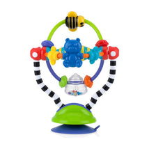 Nuby Silly Spinwheel Toy features a colorful spinning mechanism with a bear, bees, and shapes, designed for sensory play.