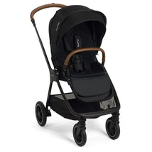 Nuna TRIV™ next stroller in Caviar/Cognac with a sleek black design and brown handle, featuring a magnetic buckle and spacious storage.