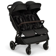 Lightweight Nuna TRVL Dubl side-by-side double stroller in caviar color, featuring two seats with adjustable canopies.