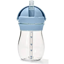 9 oz transparent straw cup with a light blue lid and measuring markings on the side, designed for toddlers.