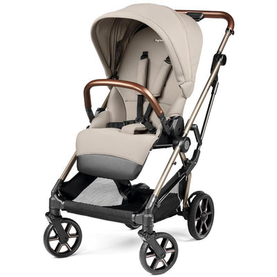 Peg Perego Vivace stroller in Astral beige, featuring a sleek design, adjustable canopy, and padded seat with safety harness.