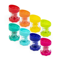 Eight colorful connecting funnels in various shades, designed as bath toys for children, showcasing vibrant, fun shapes.