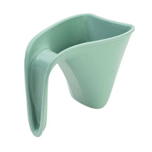 Eucalyptus green bath rinse jug with a curved handle, designed for easy pouring during bath time.