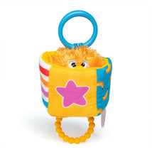 Colorful sensory toy featuring an orange plush character with eyes, inside a soft, patterned container with a blue handle.